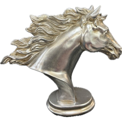 91 - Silver resin horses head, approximate height 18 inches