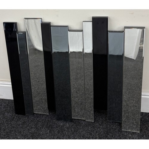 314 - Wall hanging mirror, with clear and black glass panelling, approximate measurements:  Height 27.5 in... 