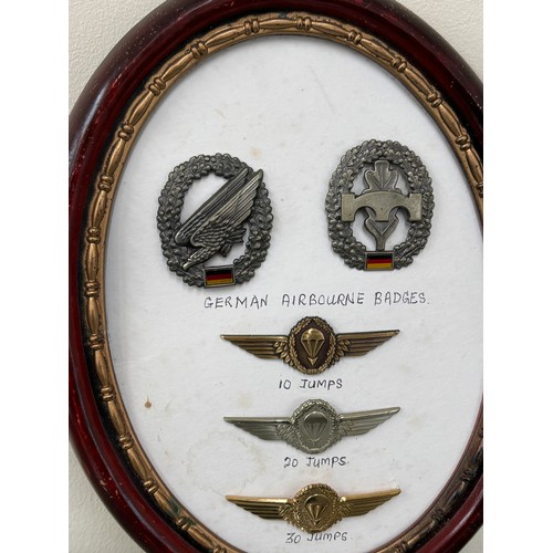 88 - Selection of 5 German cap badges in frame