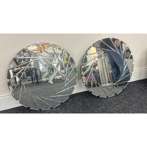 26 - Pair of circular bevelled edged mirrored wall hanging mirrors measures approximately 24 inches diame... 