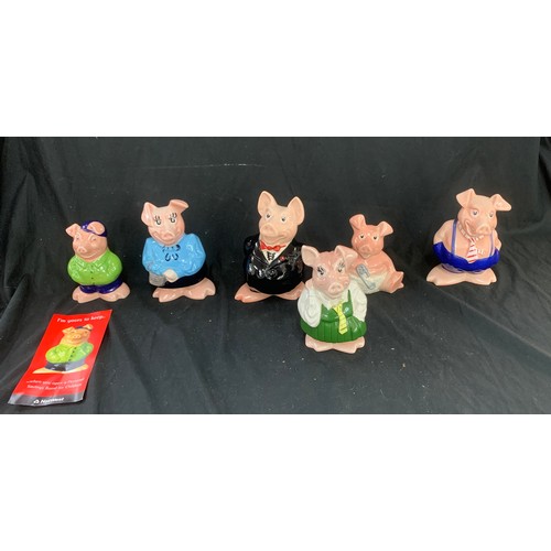 22 - Complete set of Natwest pigs with original stoppers, to include uncle Wesley