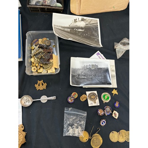 79 - Large selection of assorted cap badges etc