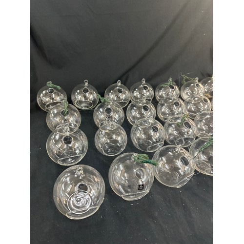 139 - Selection of approximately 40 glass floating candle holders, ideal for weddings