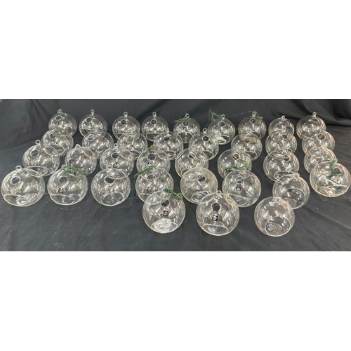 139 - Selection of approximately 40 glass floating candle holders, ideal for weddings