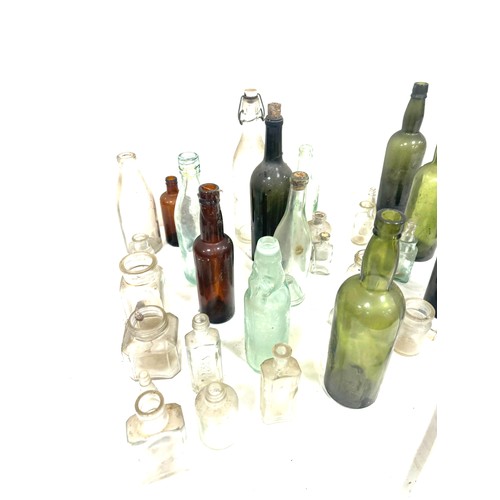 337 - Large selection of vintage and later glass bottles