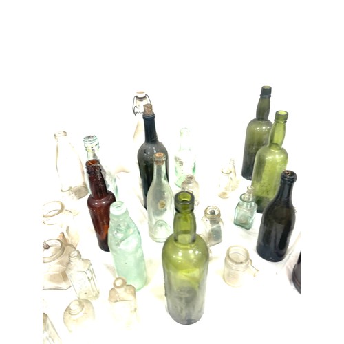 337 - Large selection of vintage and later glass bottles