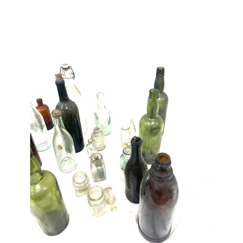 337 - Large selection of vintage and later glass bottles