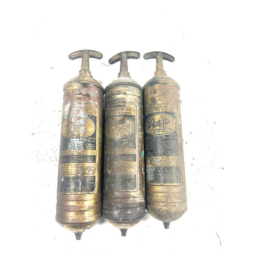 248 - Three vintage brass fire extinguishers