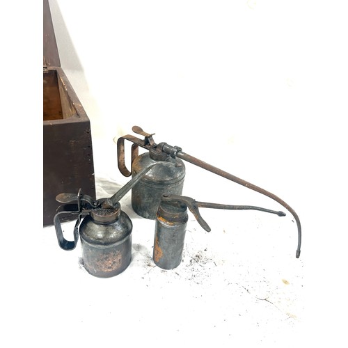 318 - Vintage wooden tool box and a selection of oil cans