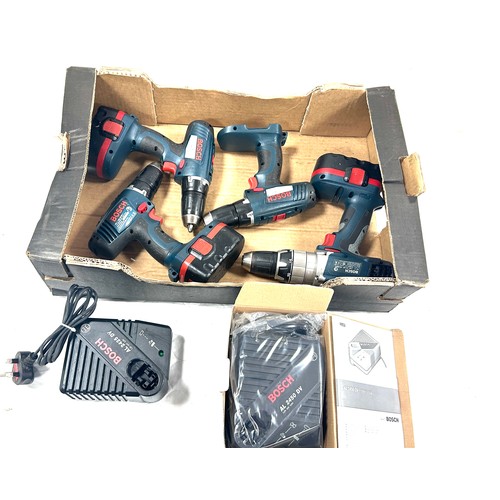 294 - Four Bosch 18 v drills with 3 batteries, 2 chargers, all in working order, batteries hold full charg... 