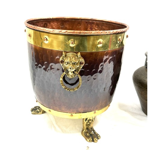 221 - Brass and copper lion detail coal bucket and a brass jardiniere largest measures approximately 12 in... 