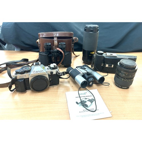 96 - Canon AE1 Program 35mm Camera, Miranda 58mm Skylight filter, Miranda 35-70mm lens, Seal binoculars m... 