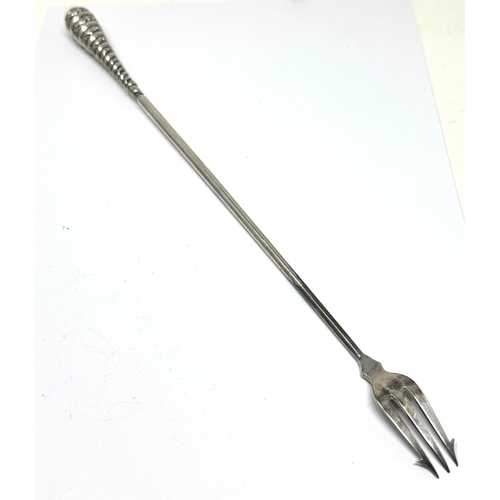 69 - Antique silver handle toasting fork measures approx  31cm long