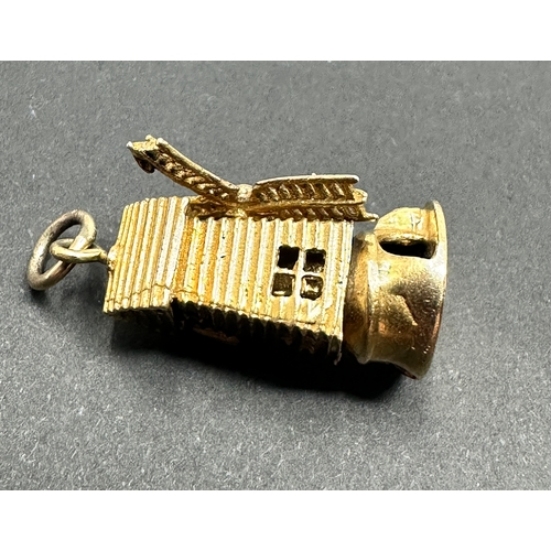 164 - vintage 9ct gold windmill charm weight 5.4g