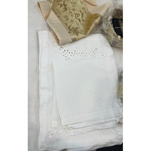 120 - Selection of linen to include Irish linen, silk, etc