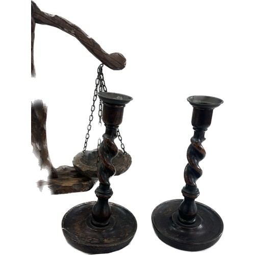 113 - Selection of wooden items to include decorative carved scales, pair barley twist candle sticks etc