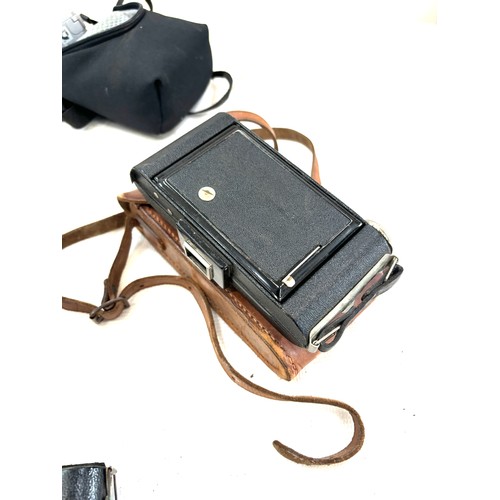 22 - Large selection of vintage cameras includes Polaroid 1000 etc