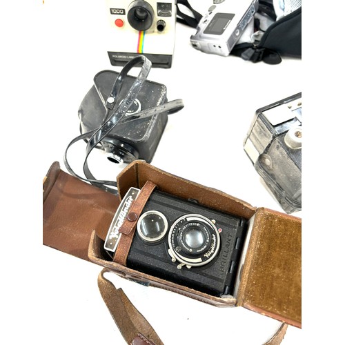 22 - Large selection of vintage cameras includes Polaroid 1000 etc