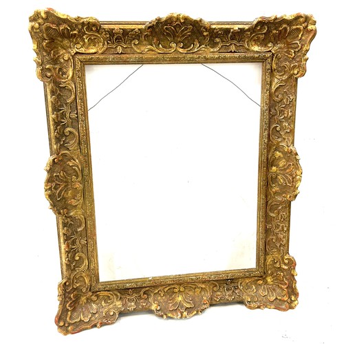 199 - Vintage gilt frame measures approximately 20 inches wide x 24 tall