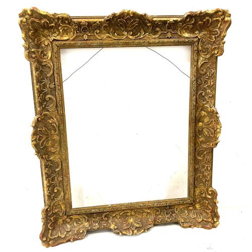 199 - Vintage gilt frame measures approximately 20 inches wide x 24 tall