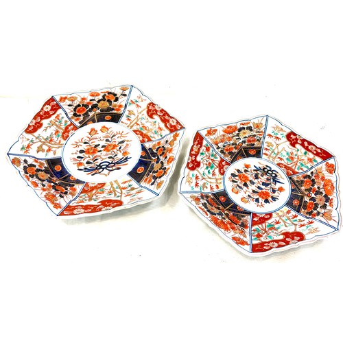 82 - 2 Japanese Imari style 6 sided plates, each measures 12 and 13 inches in diameter