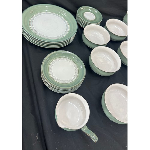 144 - Denby dinner service to include a lidded tureen, cups, bowls, side plates, dinner plates etc