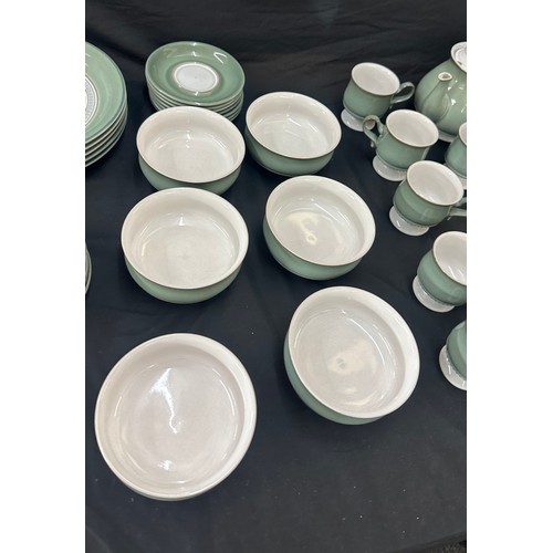 144 - Denby dinner service to include a lidded tureen, cups, bowls, side plates, dinner plates etc