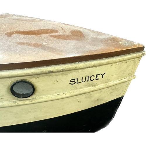 43 - Wooden boat model ' Sluicey' measures approximately 48 inches long x 10 inches wide x 9 inches tall