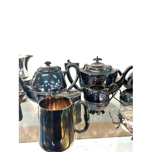 156 - Selection of silver plated items includes tea set, tea pots etc