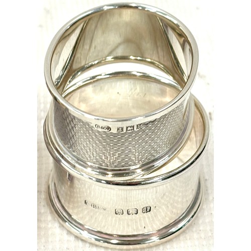 585 - 2 Hallmarked silver napkin rings and a glass and silver top trinket, overall silver weight 41g