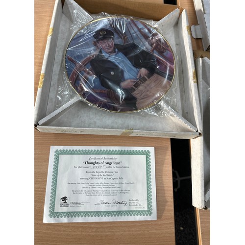 206 - Selection of vintage ' John Wayne' collectors plates to include ' John Wayne Republic Pictures Tribu... 