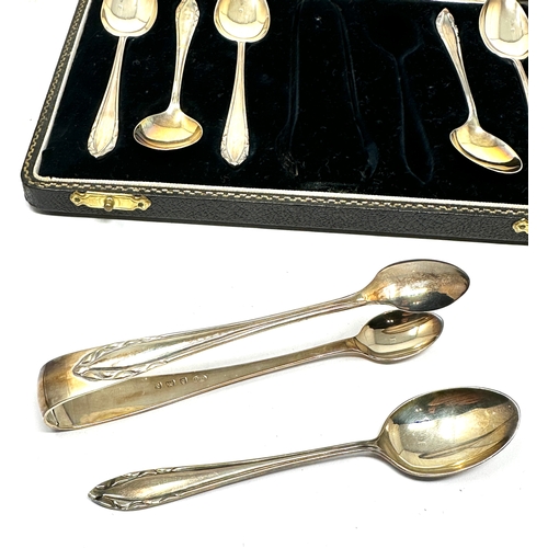 58 - Boxed set of silver tea spoons & sugar tongs weight 88g