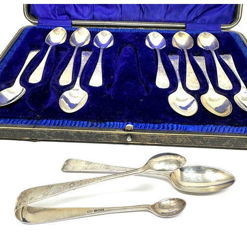 59 - Boxed set of 12 bright cut silver tea spoons & sugar tongs weight 187g g