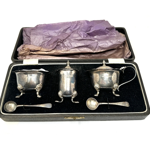 60 - Boxed silver cruet set Birmingham silver hallmarks blue glass liners silver weight 132g