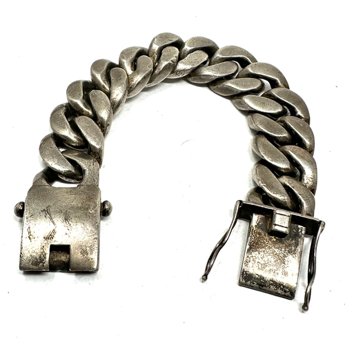 82 - Very heavy chunky silver curb link bracelet measures approx 2.5cm wide 26cm long weight 335g