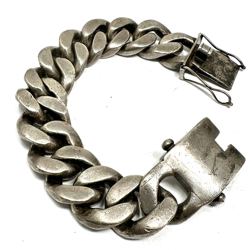 82 - Very heavy chunky silver curb link bracelet measures approx 2.5cm wide 26cm long weight 335g