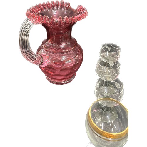 271 - Selection of glassware to include a cranberry glass jug