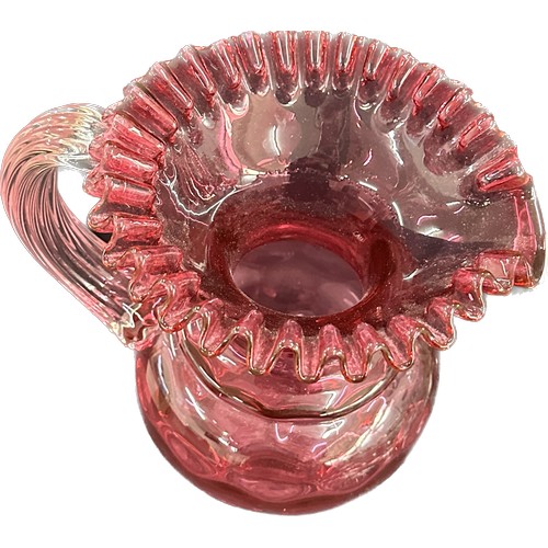 271 - Selection of glassware to include a cranberry glass jug