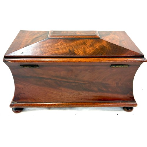 1 - Large antique sarcophagus shaped flamed mahogany tea caddy with original internal sections, approxim... 