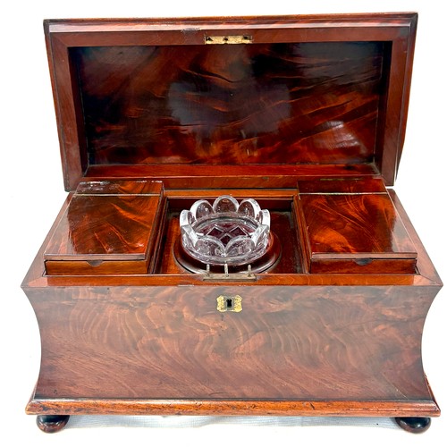 Large antique sarcophagus shaped flamed mahogany tea caddy with original internal sections, approximate measurements: Height 10.5 inches, Length 15 inches, Depth 9 inches