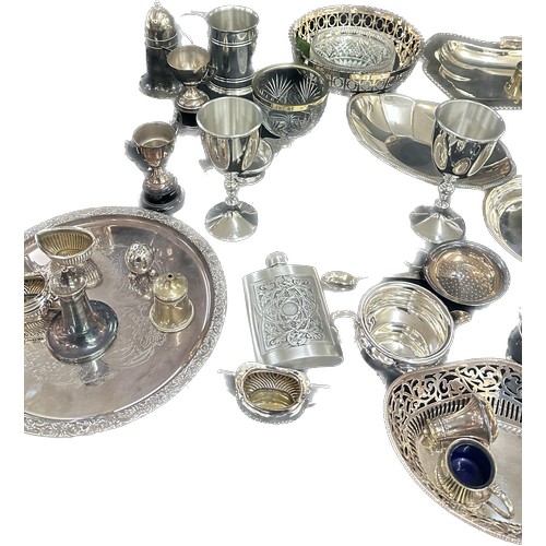 191 - Large selection of silver plated ware includes candle sticks, toast rack, egg cups etc