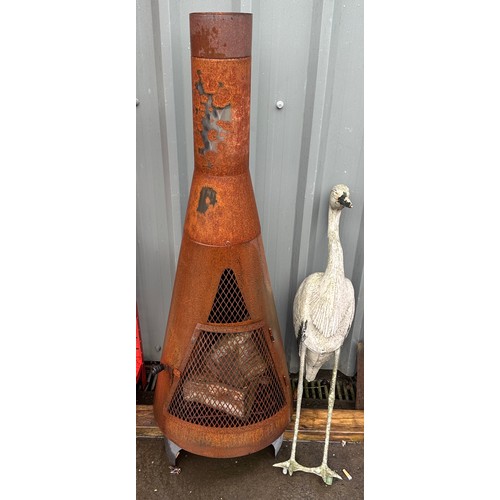 100B - Log fire burner and a garden ornament