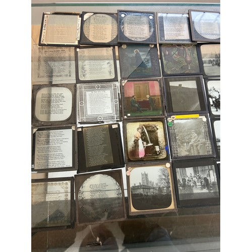 413 - Large selection of vintage magic lantern slides in a wooden box