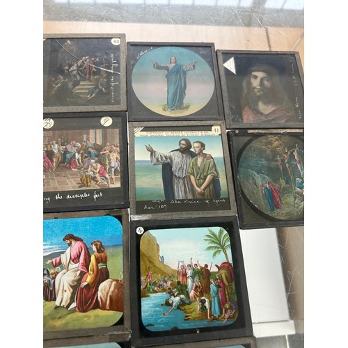 413 - Large selection of vintage magic lantern slides in a wooden box