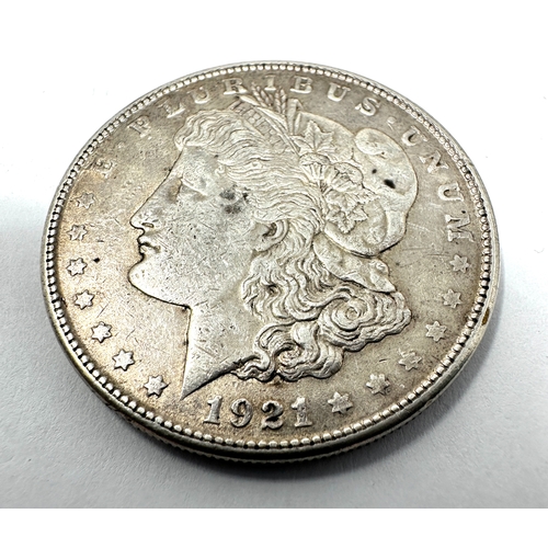 243 - 1921- s silver one dollar