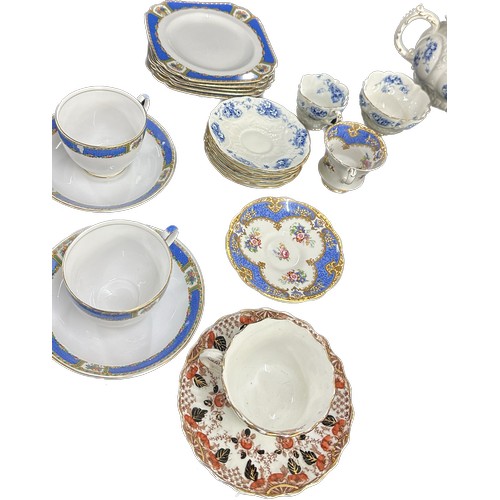 202 - Selection of part vintage tea services to include cup, saucers, tea pot etc