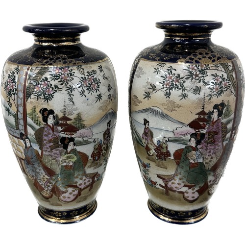 283 - Two vintage Japanese porcelain Satsuma hand painted figural vases both with three character marks to... 