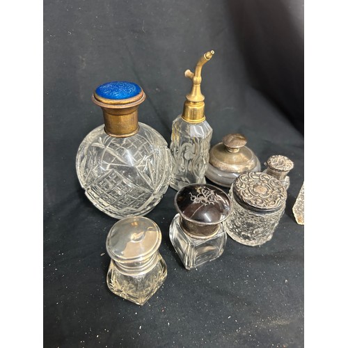 29 - Selection of vintage and later scent bottles includes silver topped etc