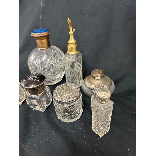 29 - Selection of vintage and later scent bottles includes silver topped etc