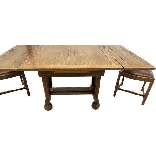 393 - Oak draw leaf  table and four chairs overall approximate measurements when extended 60 inches wide x... 